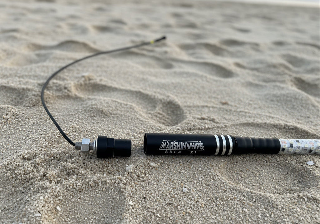 Two Marshin Whips with 'Area 51' branding on a desert background