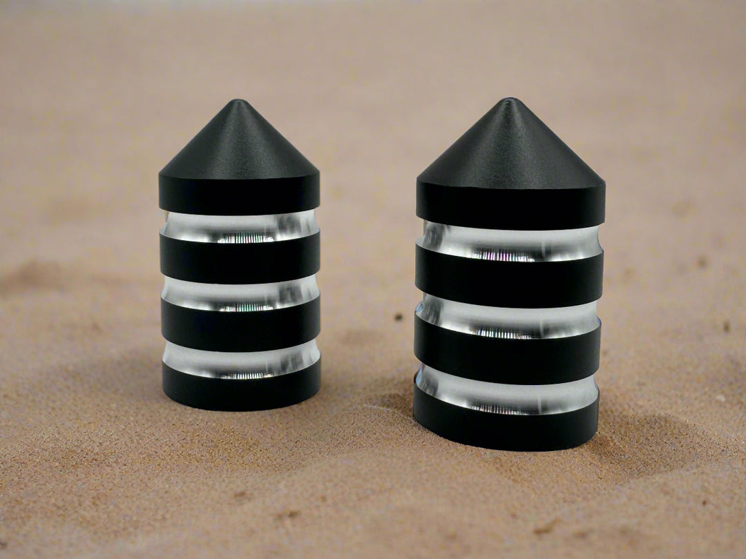 Two black magnetic base caps 