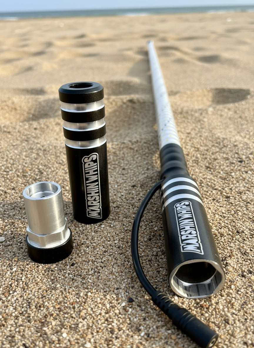 Chrystal Grey Game Changer Single on a sandy beach