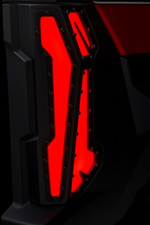 Close-up of a Polaris Expedition taillight on a dark background