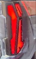 Red and black expedition tail light cover on a vehicle