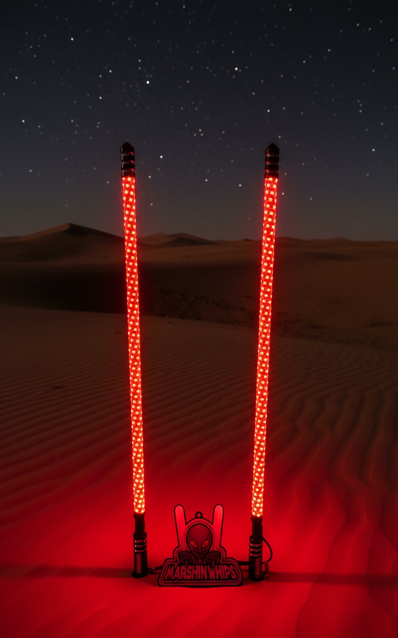 Red LED whips with a visible brand logo on a dunes background