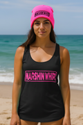 Woman wearing a black tank top and pink beanie with 'Marshin Whips' branding on a beach.