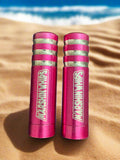 Two pink Marshin Whip bases on a beach