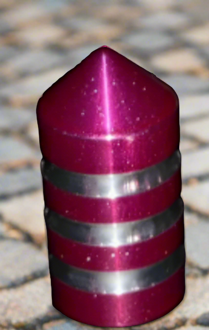 Metallic pink and silver Whip Basecap on a city street background