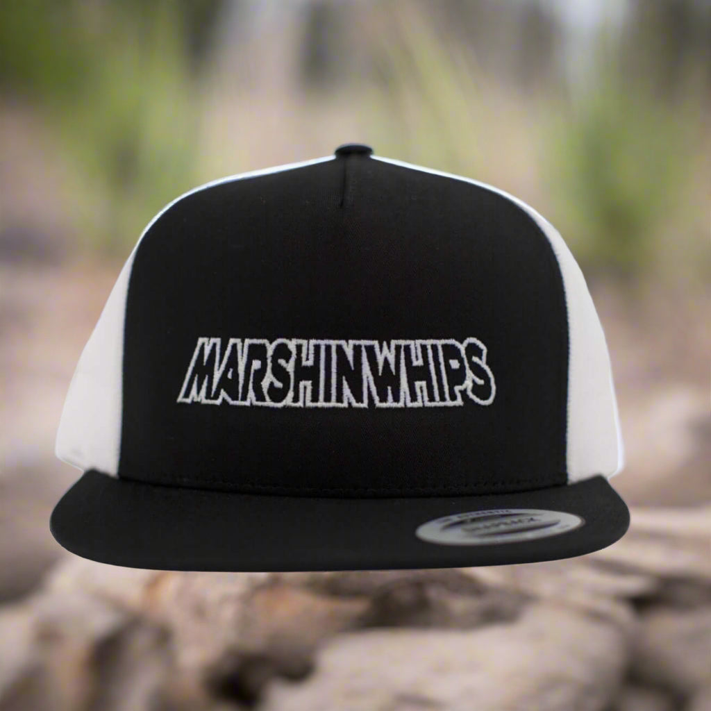 Black and white cap with 'MARSHINWHIPS' logo on a gray background
