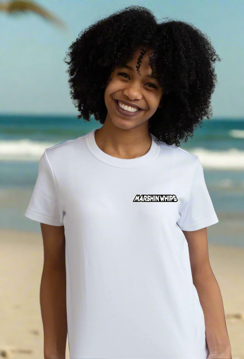 Person wearing a white t-shirt with 'Marshin Whips' text 