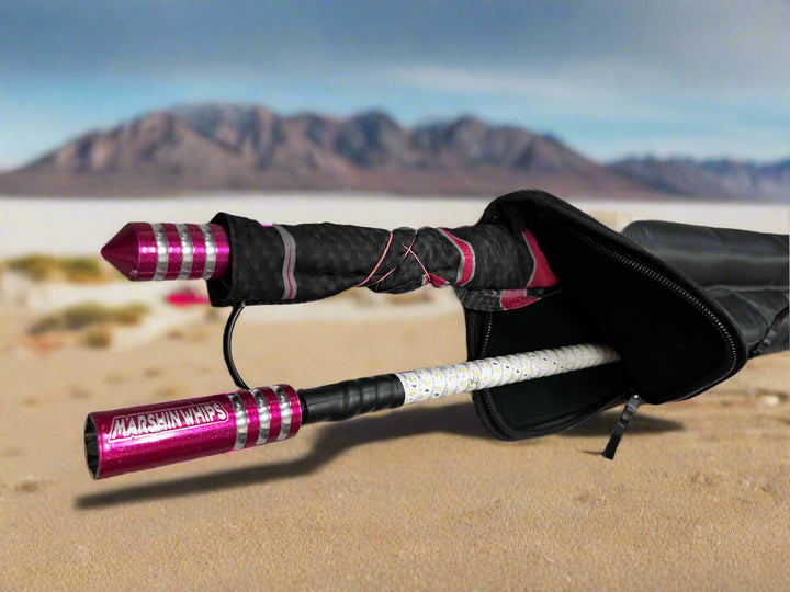 Pink whip storage compartment.