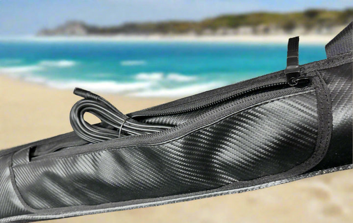 Zipper compartment showing a work light extension pocket