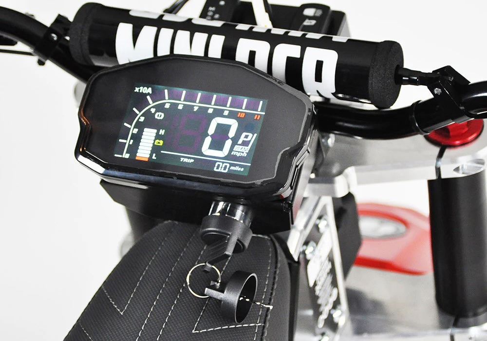 Close-up of a motorcycle's digital dashboard with visible branding on the handlebars.