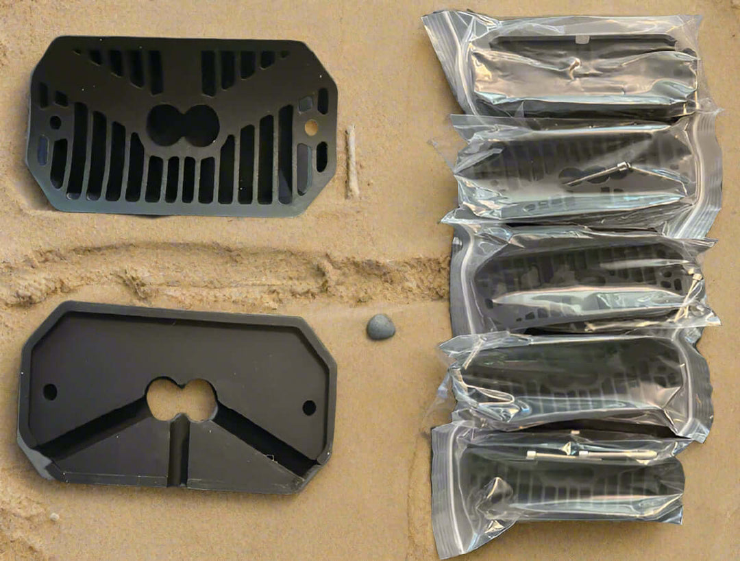 Two black billet casings and a set of 8 packaged casings for the rock light case.