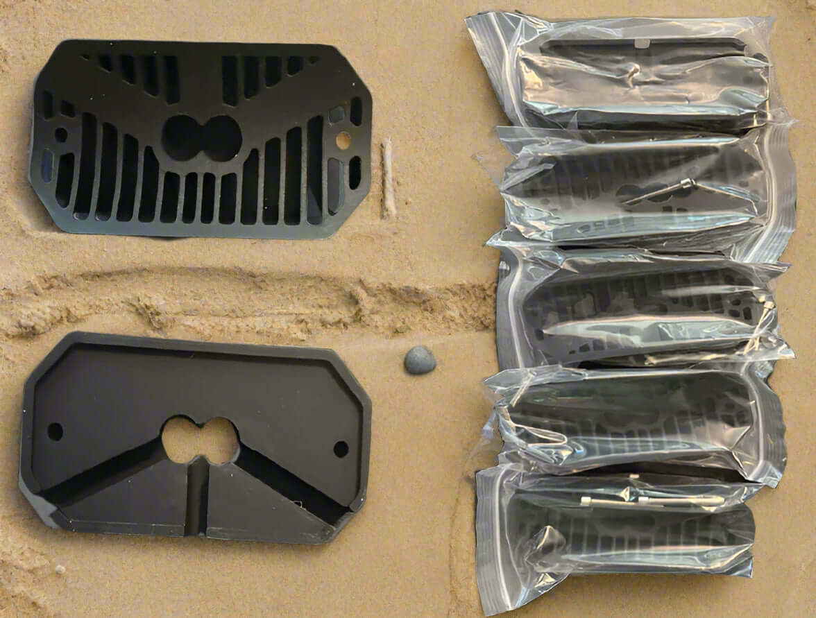 Two black billet casings and a set of 8 packaged casings for the rock light case.