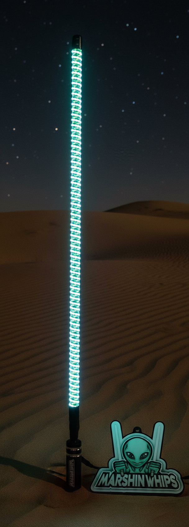 Marshin Whip glowing green LEDs on the sand dunes.