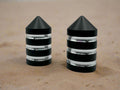 Two black magnetic base caps 
